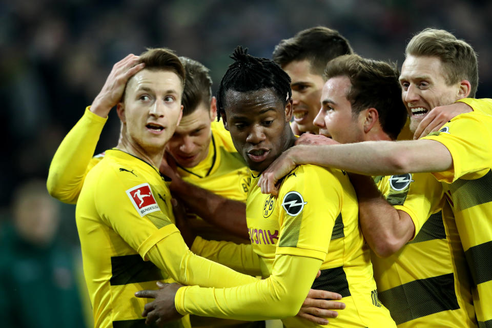 Marco Reus celebrates with his Borussia Dortmund teammates