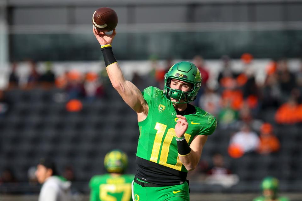 Oregon quarterback Bo Nix throws out a pass before the game as the No. 9 Oregon Ducks take on the No. 21 Oregon State Beavers at Reser Stadium in Corvallis, Ore. Saturday, Nov. 26, 2022. 
