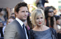 In this June 24, 2010 file photo, actress Jennie Garth, right, and her husband actor Peter Facinelli arrive at the premiere of "The Twilight Saga: Eclipse" in Los Angeles. In a joint statement, the couple said they've decided to end their marriage. They have been married for 11 years and are parents to three daughters. (AP Photo/Chris Pizzello)