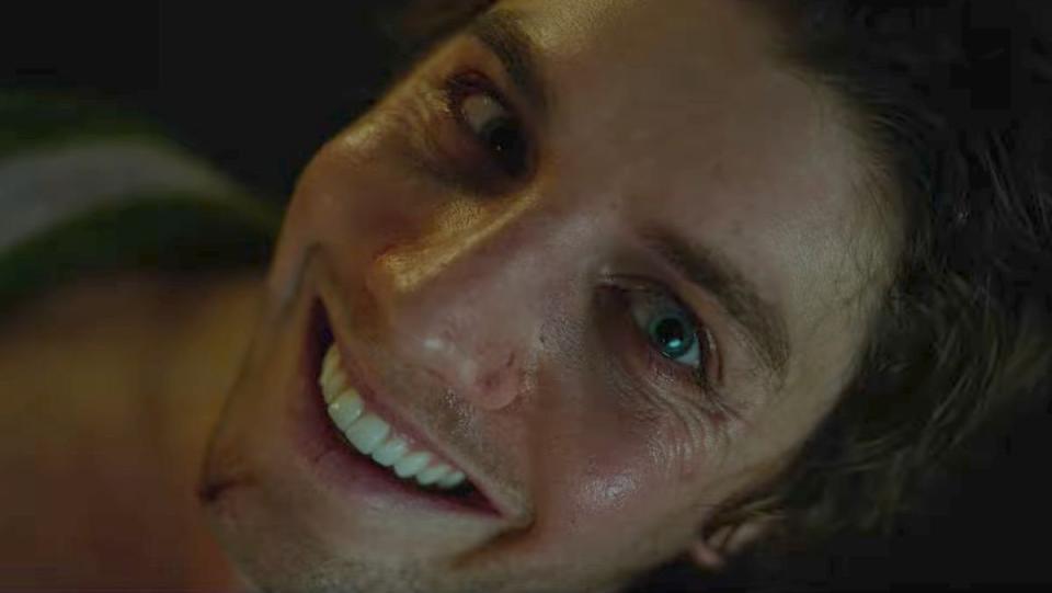 Smile 2 trailer featuring a man smiling creepily into the camera