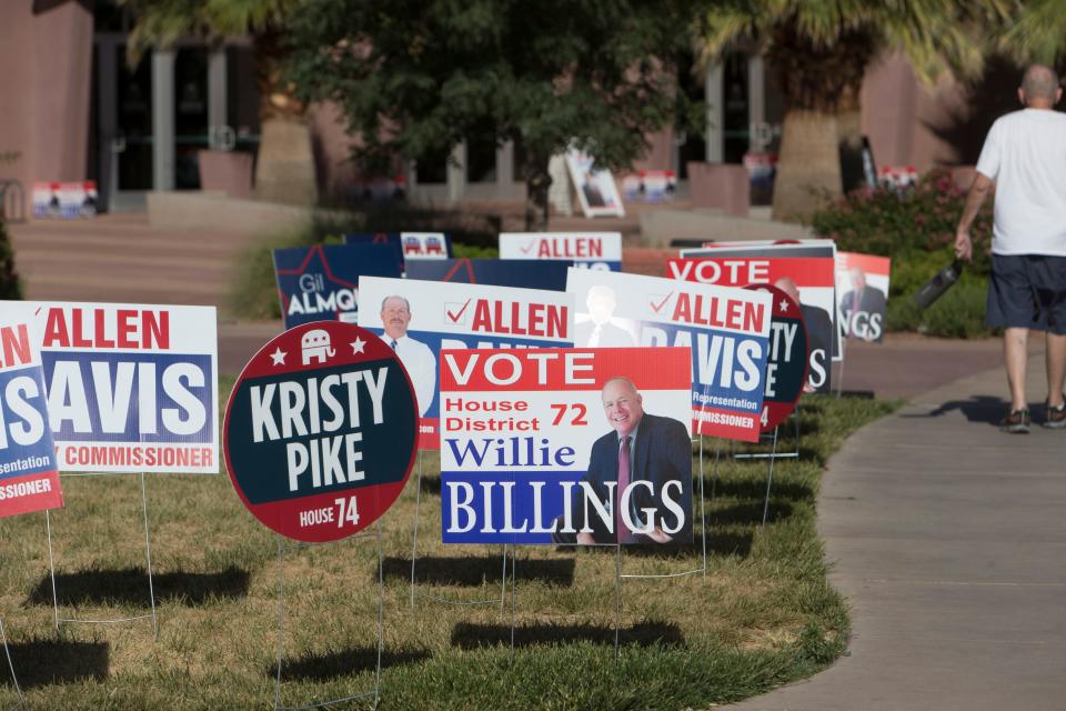 Campaign signs litter the lawn outside the Dixie Convention Center ahead of the Washington County Republican Party's debates for the upcoming 2022 primary election. The debates were held on Tuesday, May 17, 2022.