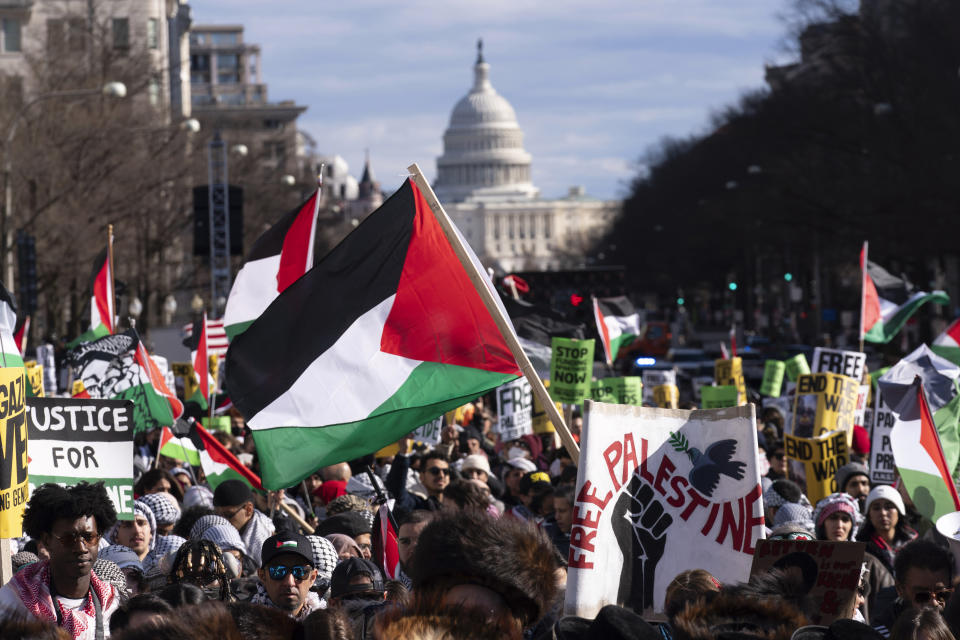 With the U.S Capitol in the background, demonstrators rally during the March on Washington for Gaza at Freedom Plaza in Washington, Saturday, Jan. 13, 2024. (AP Photo/Jose Luis Magana)