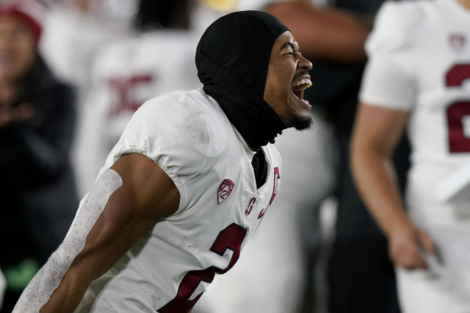 Stanford safety Jonathan McGill reacts as he runs ontp the field after Stanford defeated Notre Dame 16-14 in an NCAA college football game in South Bend, Ind., Saturday, Oct. 15, 2022. (AP Photo/Nam Y. Huh)