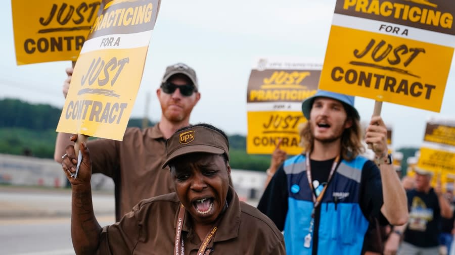 UPS Teamsters and workers rally July 21 in Atlanta, as a national strike deadline nears. (AP Photo/Brynn Anderson)