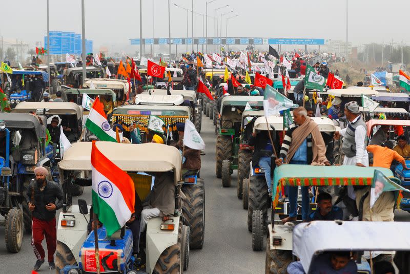 FILE PHOTO: Rally to protest against the newly passed farm bills, on a highway on the outskirts of New Delhi