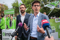 Members of the European Greens party Gabor Vago and Bas Eickhout campaign for the European Elections in Budapest, Hungary May 3, 2019. Gabor Banko/LMP/Handout via REUTERS