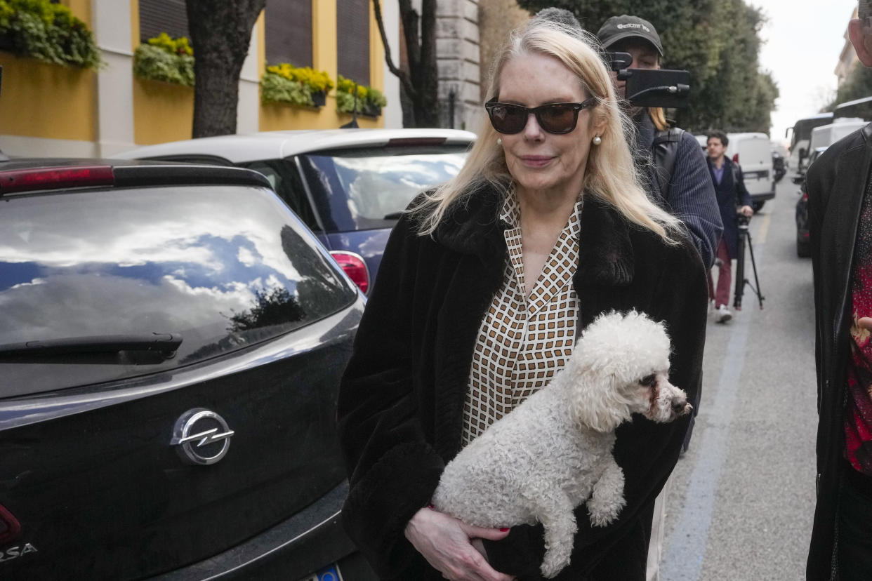 Texas-born Princess Rita Boncompagni Ludovisi, born Rita Jenrette Carpenter and last wife of late Prince Nicolo Boncompagni Ludovisi, leaves her residence, The Casino dell'Aurora, also known as Villa Ludovisi, during the execution of an eviction order, in Rome, Thursday, April 20, 2023. The villa contains the only known ceiling painted by Caravaggio and Princess Ludovisi is facing a court-ordered eviction Thursday, in the latest chapter in an inheritance dispute with the heirs of one of Rome's aristocratic families. (AP Photo/Andrew Medichini)