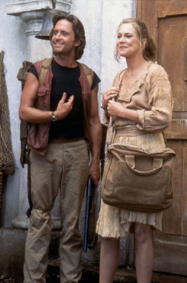 Michael Douglas and Kathleen Turner on the set of "Romancing the Stone"<p><a href="https://www.gettyimages.com/detail/607401026" rel="nofollow noopener" target="_blank" data-ylk="slk:Sunset Boulevard/Getty Images;elm:context_link;itc:0;sec:content-canvas" class="link ">Sunset Boulevard/Getty Images</a></p>