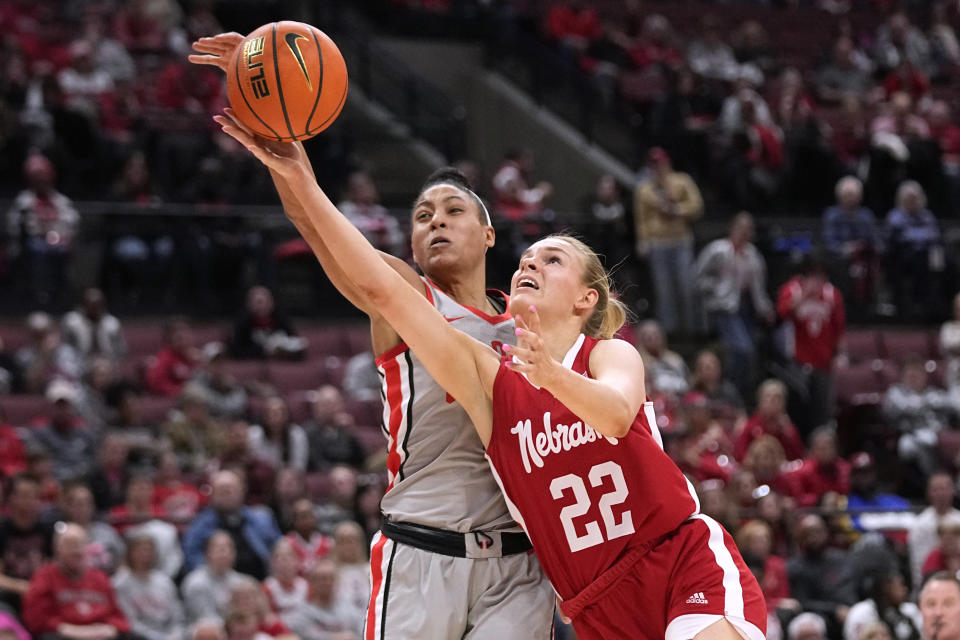 Ohio State guard Taylor Thierry, left, blocks a shot by Nebraska forward Natalie Potts (22) during the first half of an NCAA college basketball game Wednesday, Feb. 14, 2024, in Columbus, Ohio. (AP Photo/Sue Ogrocki)