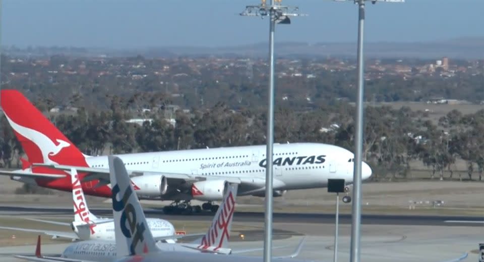 A delayed Qantas plane made a wobbly landing as it touched down in Melbourne. Source: Storyful