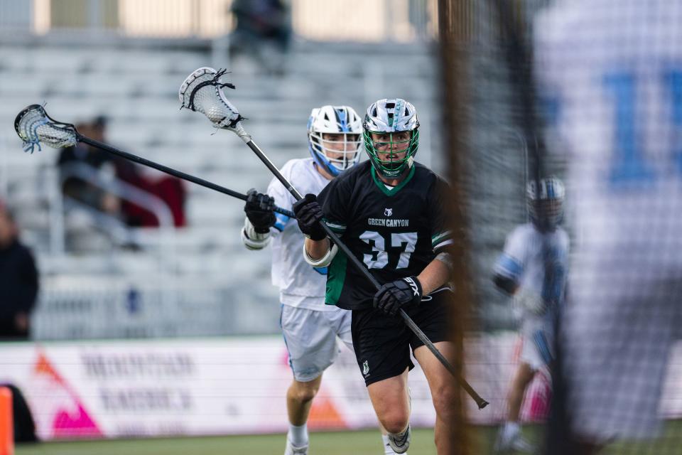 Green Canyon’s Jackson Landon (37) drives to the goal during the 4A boys lacrosse championships at Zions Bank Stadium in Herriman on May 26, 2023. | Ryan Sun, Deseret News