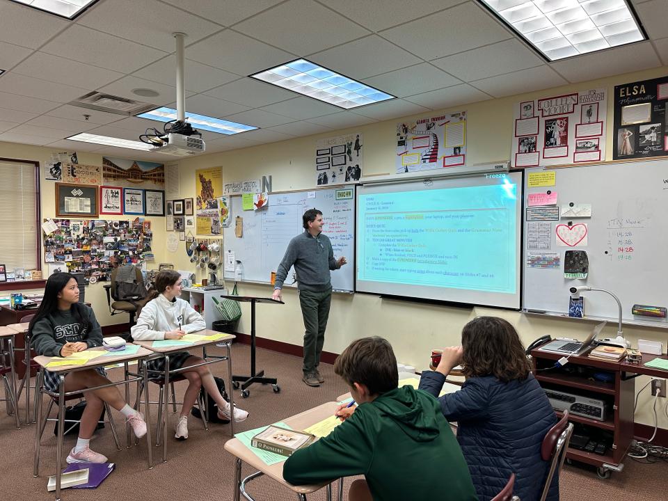 Savannah Country Day School English teacher Neil Gabbey leads students in a discussion.