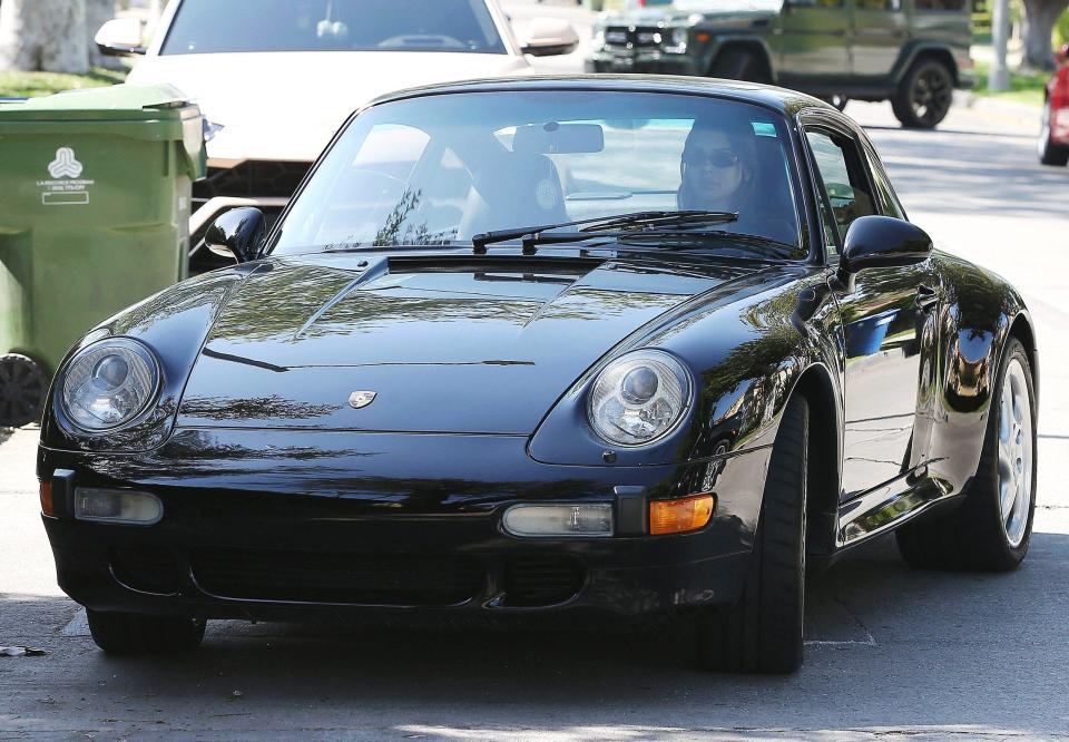 Model Kendall Jenner following his dads footsteps into car collection as she shows up in a vintage Porsche Carrera in West Hollywood