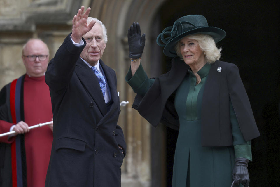 Britain's King Charles III, center, and Queen Camilla arrive to attend the Easter Matins Service at St. George's Chapel, Windsor Castle, England, Sunday, March 31, 2024. (Hollie Adams/Pool Photo via AP)
