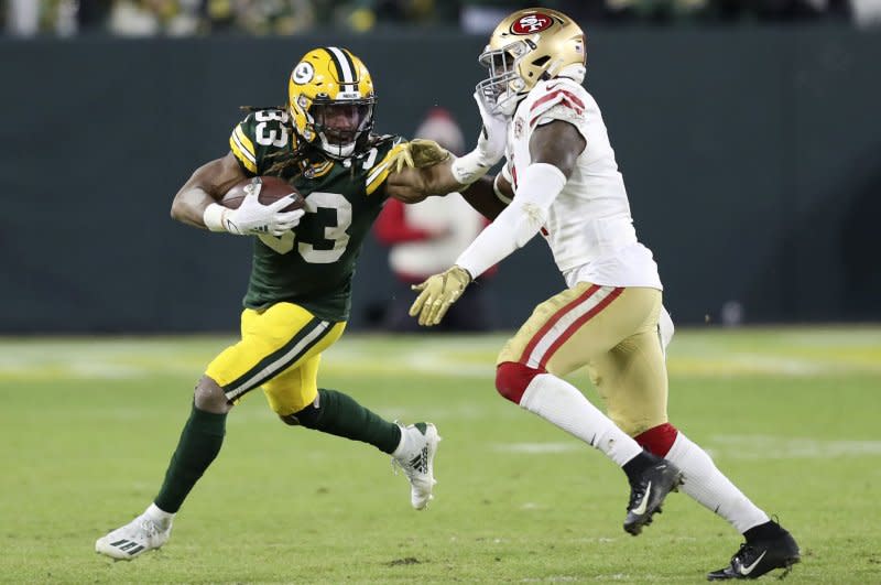 Running back Aaron Jones (L) referenced pay-cut negotiations with the Green Bay Packers on Tuesday on X. File Photo by Aaron Josefczyk/UPI