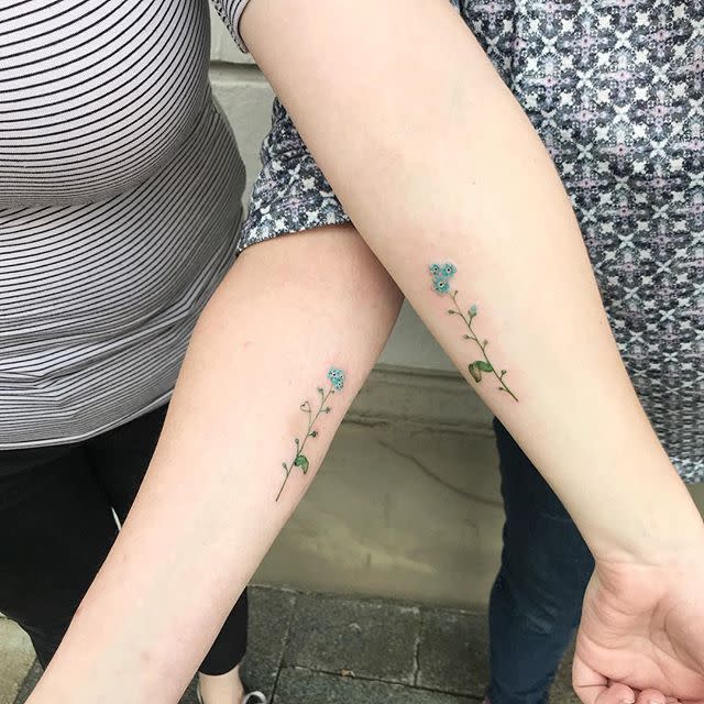 10) This Mother-Daughter Stem Tattoo