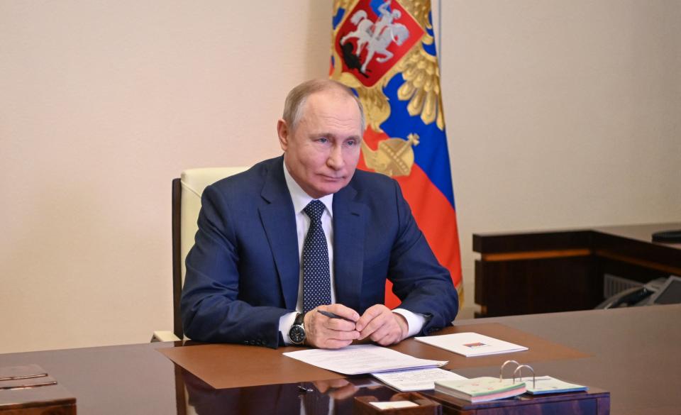 Russian President Vladimir Putin attends a flag raising ceremony on the ferry Marshal Rokossovsky via a video link at the Novo-Ogaryovo state residence outside Moscow on March 4, 2022. (Photo by Alexey NIKOLSKY / SPUTNIK / AFP) (Photo by ALEXEY NIKOLSKY/SPUTNIK/AFP via Getty Images)