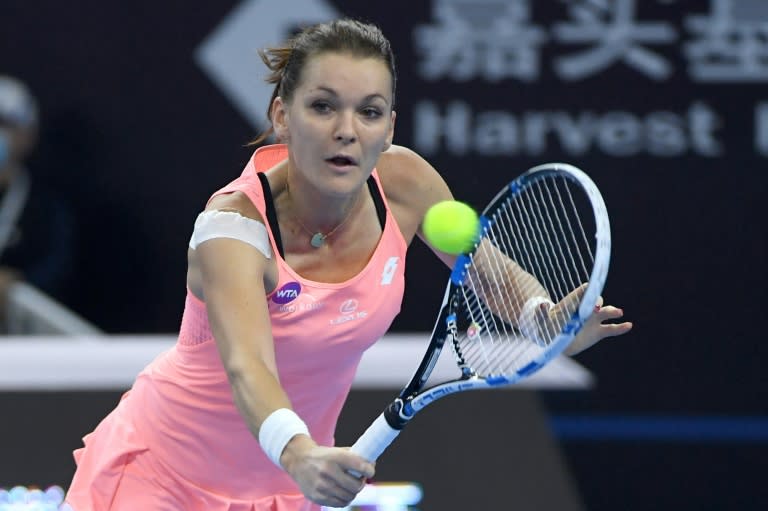 Agnieszka Radwanska broke Caroline Wozniacki's serve three times in each set to book her China Open quarter-final spot with a 6-3, 6-1 win