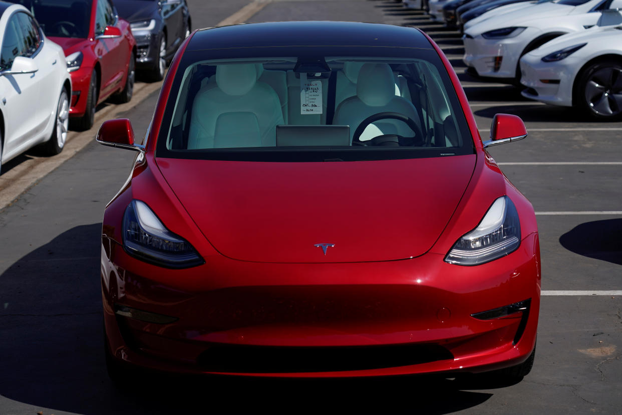 A new Tesla Model 3 is shown at a delivery center on the last day of the company's third quarter, in San Diego, California, September 30, 2019. REUTERS/Mike Blake