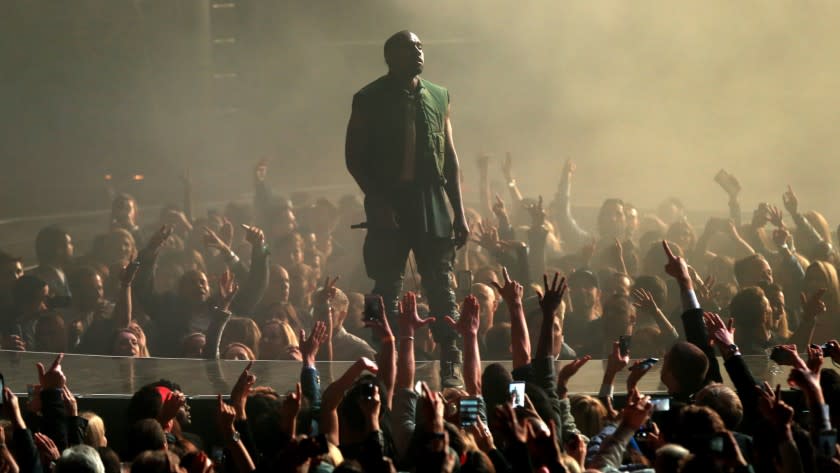 Recording artist Kanye West performs at the DirecTV Super Bowl party in Glendale, Ariz., on Jan. 31.