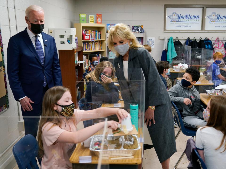 President Joe Biden and first lady Jill Biden watch a student demonstrate her project during a visit to Yorktown Elementary School, on Monday, May 3, 2021, in Yorktown, Virginia.AP