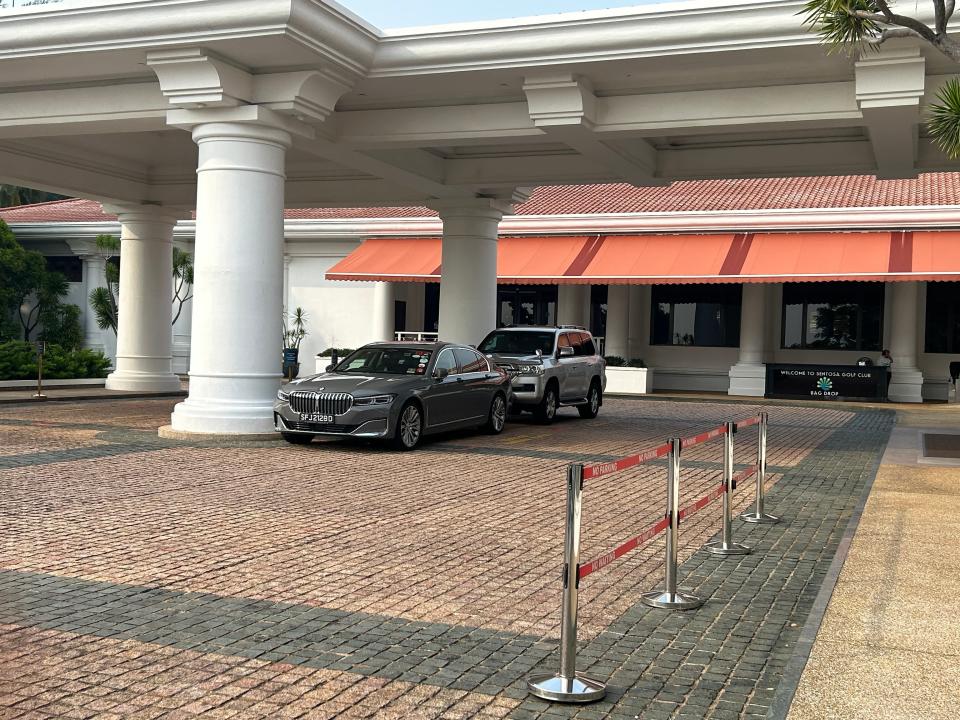 Several luxury cars outside Sentosa Golf Club.