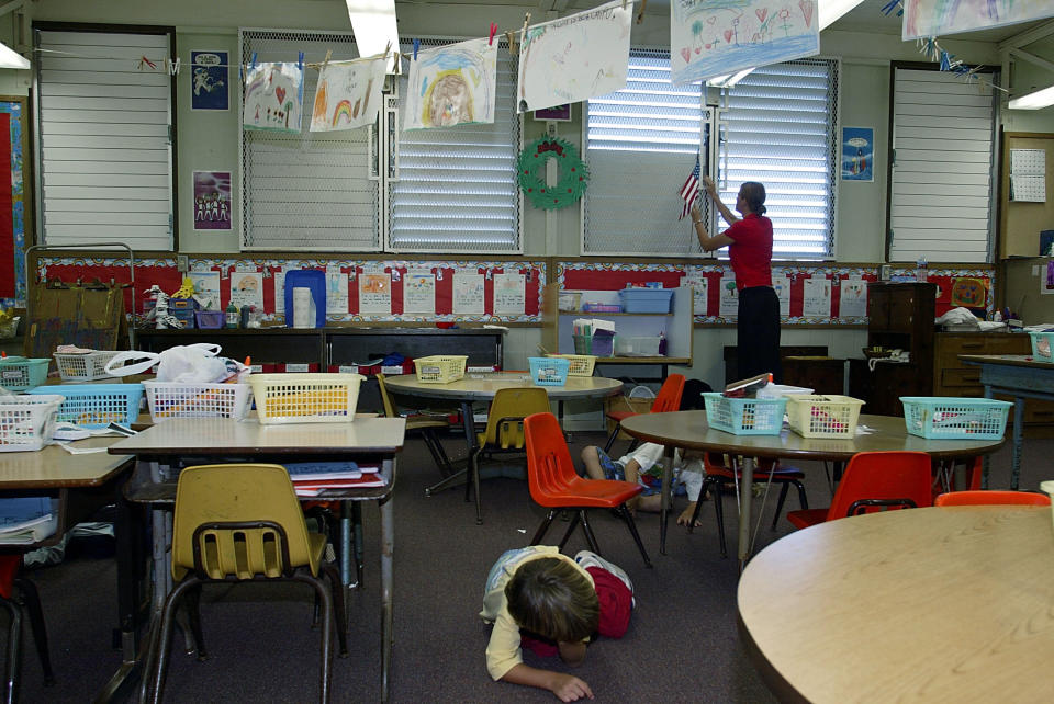 In this file photo from 2003, students in Hawaii participate in a classroom lockdown drill.&nbsp; (Photo: Phil Mislinski via Getty Images)