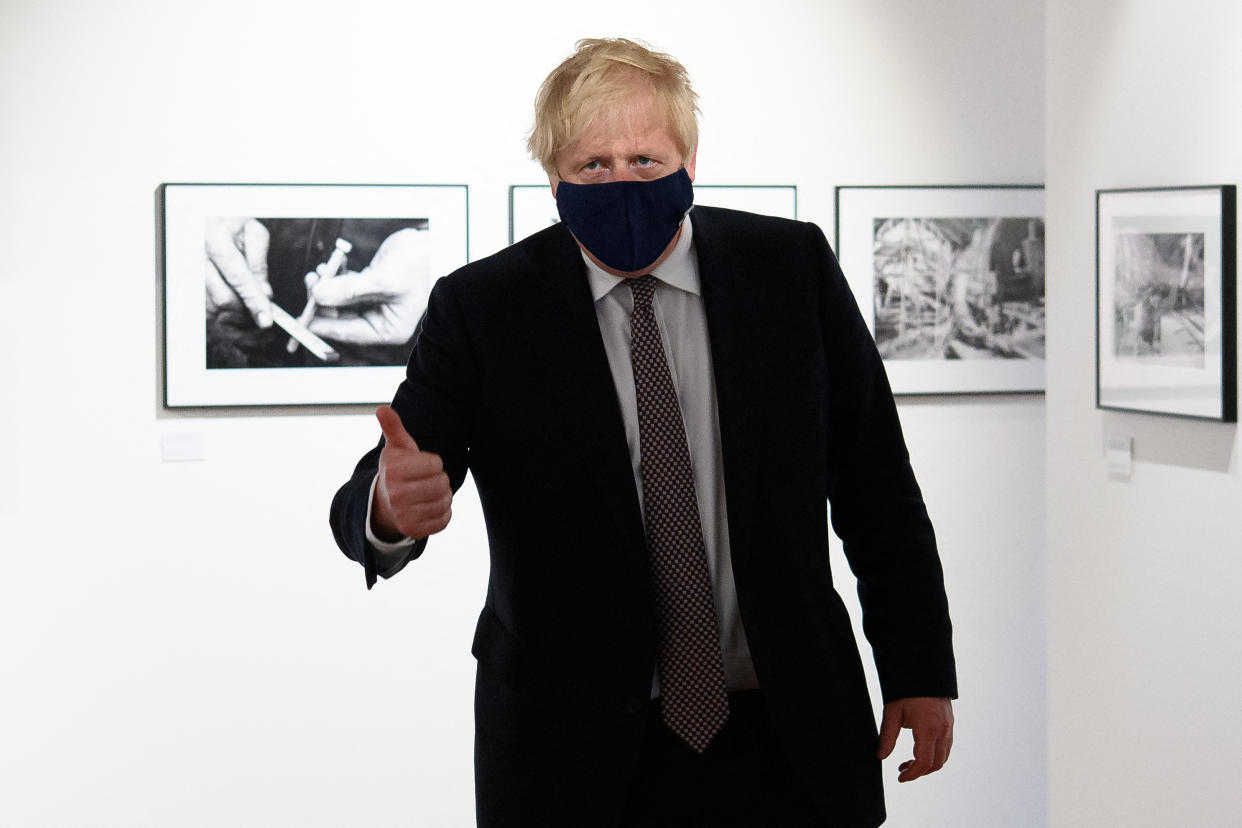 Britain's Prime Minister Boris Johnson makes a thumbs-up gesture reacts during a visit to Falmouth's Maritime Museum, where he met and thanked volunteers hosting the media centre for the G7 Summit, in Falmouth, Cornwall on June 10, 2021, ahead of the three-day G7 summit being held from 11-13 June. - G7 leaders from Canada, France, Germany, Italy, Japan, the UK and the United States meet this weekend for the first time in nearly two years, for the three-day talks in Carbis Bay, Cornwall. - (Photo by Leon Neal / POOL / AFP) (Photo by LEON NEAL/POOL/AFP via Getty Images)