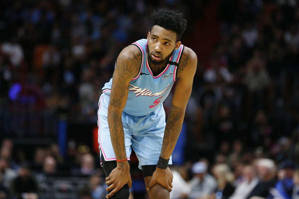 Derrick Jones Jr. #5 of the Miami Heat looks on against the Dallas Mavericks during the second half at American Airlines Arena.