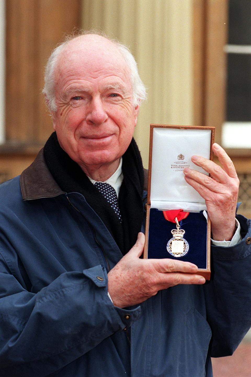 Peter Brook outside Buckingham Palace after receiving the Insignia of a member of the Order of the Companions of Honour from the Queen (PA) (PA Wire)