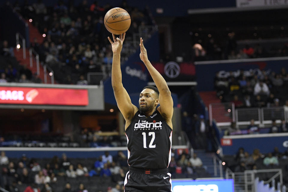 Washington Wizards forward Jabari Parker (12) shoots during the first half of an NBA basketball game against the Memphis Grizzlies, Saturday, March 16, 2019, in Washington. (AP Photo/Nick Wass)