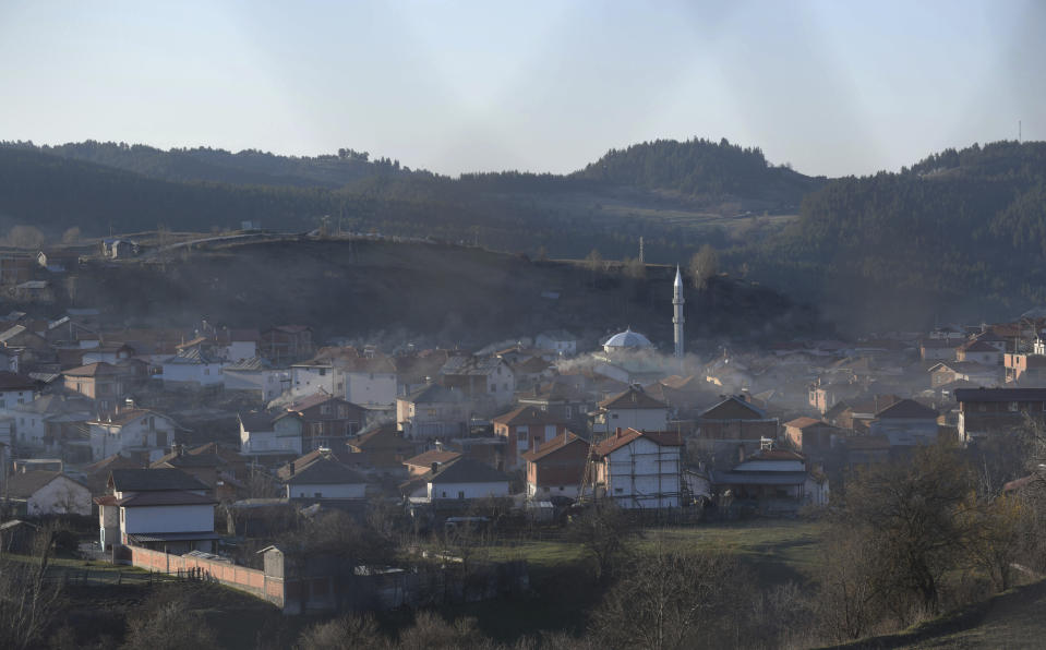 General view from the village of Ribnovo, Bulgaria, Sunday, April 11, 2021. Despite the dangers associated with COVID-19 and government calls to avoid large gatherings, Hundreds of people flocked to the tiny village of Ribnovo in southwestern Bulgaria for a four-day festival of feasting, music and the ritual of circumcision which is considered by Muslims a religious duty and essential part of a man's identity. (AP Photo/Jordan Simeonov)