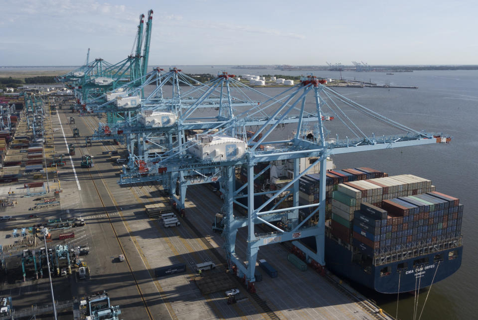 FILE - In this Friday, May 10, 2019 file photo, a container ship is unloaded at the Virginia International Gateway terminal in Norfolk, Va. U.S. factories expanded unexpectedly in January 2020, snapping a five-month losing streak. The Institute for Supply Management, an association of purchasing managers, said Monday, Feb. 3, 2020, that its manufacturing index rose to 50.9 in January, from 47.8 in December. Anything above 50 signals expansion. (AP Photo/Steve Helber, File)