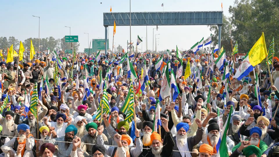 Farmers shout slogans during a protest demanding minimum crop prices, near the Haryana-Punjab state border at Shambhu in Patiala district about 200 kilometers north of New Delhi on February 16, 2024. - Narinder Nanu/AFP/Getty Images