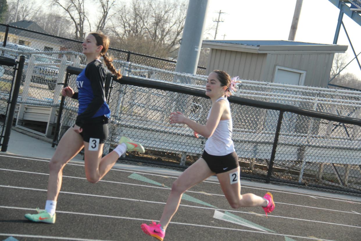 Perry's Taryn Nehring and Nevada's Sophia Martinez sprint to the finish in the 400-meter dash during the Jayette Relays on Thursday, March 28, 2024, in Perry.