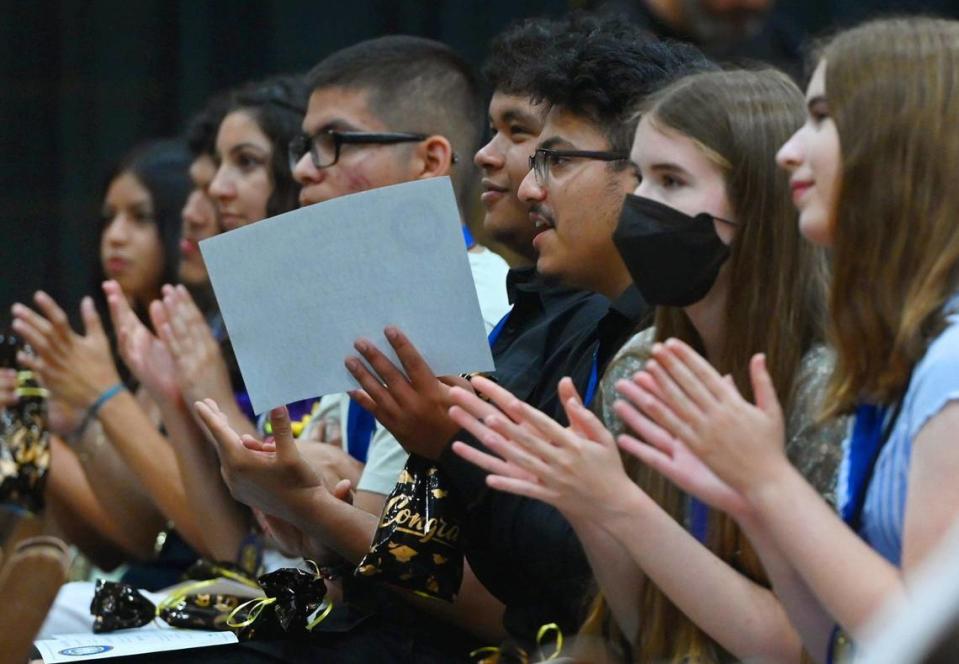 Graduates applaud as Edison High School honors its 130 graduating seniors who have earned the California Seal of Biliteracy during a ceremony Thursday, May 18, 2023 in Fresno.