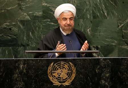 FILE PHOTO: Iranian President Rouhani gestures at the conclusion of his address to the 69th UN General Assembly at the UN Headquarters in New York