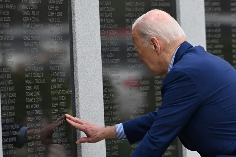 US President Joe Biden pays respects to his uncle World War II veteran Ambrose J, Finnegan, Jr. at the Veterans War Memorial in Scranton, Pennsylvania, before departing for Pittsburgh, on April 17, 2024. Biden is traveling to Pittsburgh, Pennsylvania, to meet with steelworkers. (ANDREW CABALLERO-REYNOLDS)