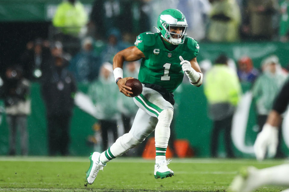 PHILADELPHIA, PENNSYLVANIA – NOVEMBER 26: Jalen Hurts #1 of the Philadelphia Eagles runs the ball during the first quarter against the Buffalo Bills at Lincoln Financial Field on November 26, 2023 in Philadelphia, Pennsylvania. (Photo by Tim Nwachukwu/Getty Images)