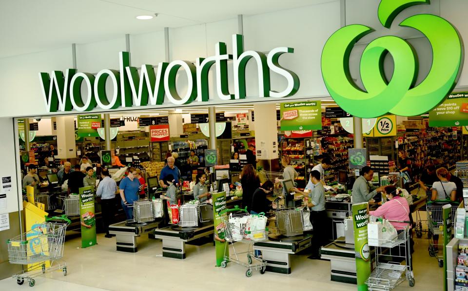 People shop at a Woolworths supermarket in Sydney on March 17, 2020. - Australia's elderly were let in early to supermarkets on March 17, but coronavirus panic buying still proved too much in some areas, with reports of empty shelves and large queues. (Photo by PETER PARKS / AFP) (Photo by PETER PARKS/AFP via Getty Images)