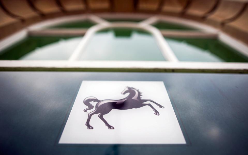 A Lloyds Banking Group Plc company logo above an ATM in Chelmsford