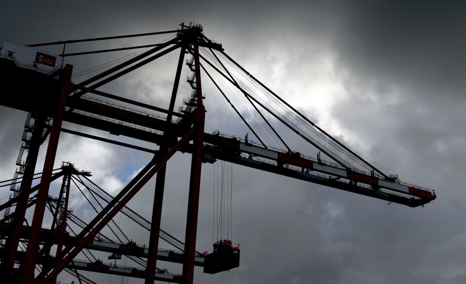 Containers are unloaded from a ship moored up in the new Peel Ports container terminal in Liverpool on November 4, 2016.   The new deep water facility will complement the existing Royal Seaforth Container Terminal at the existing Port of Liverpool, with each terminal having capacity to handle around 1 million containers a year. / AFP / PAUL ELLIS        (Photo credit should read PAUL ELLIS/AFP/Getty Images)