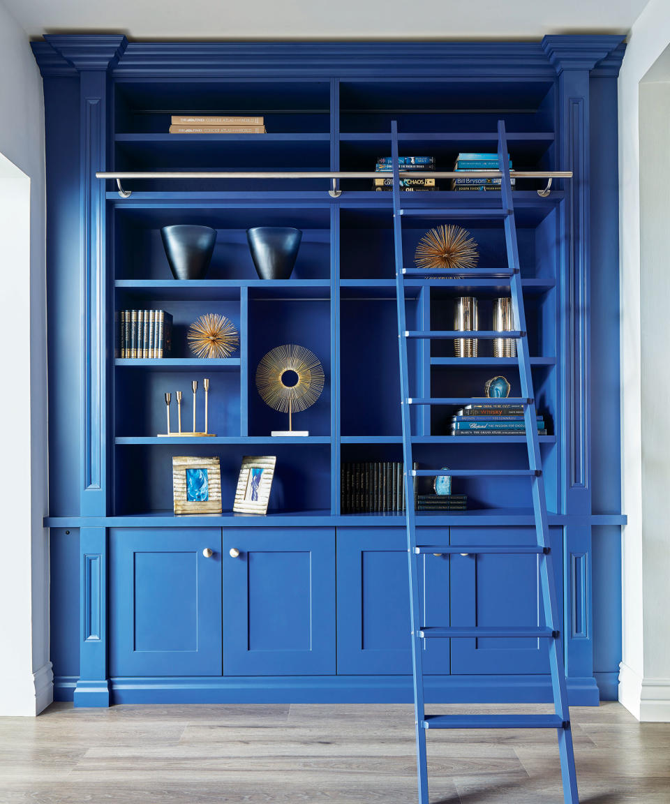 <p> &#x2018;Made to measure from floor to ceiling and wall to wall, no part of this furniture is unused,&#x2019; says Simon Tcherniak, Senior Designer at&#xA0;Neville Johnson. &#x2018;The addition of the library ladder is a practical addition that allows access to the upper shelves and, while it adds character to the furniture, by matching the colour of the cabinetry means it won&#x2019;t look obtrusive.&#x2019;&#xA0; </p> <p> While a similar piece would look beautiful in a dedicated library or home office, a bespoke piece of fitted furniture like this is an especially wonderful way to utilise and add interest to a hallway space. By choosing a bold colourway, you&apos;re taking the cabinetry beyond a piece of practical furniture and turning it into a personality-laden focal point. </p>
