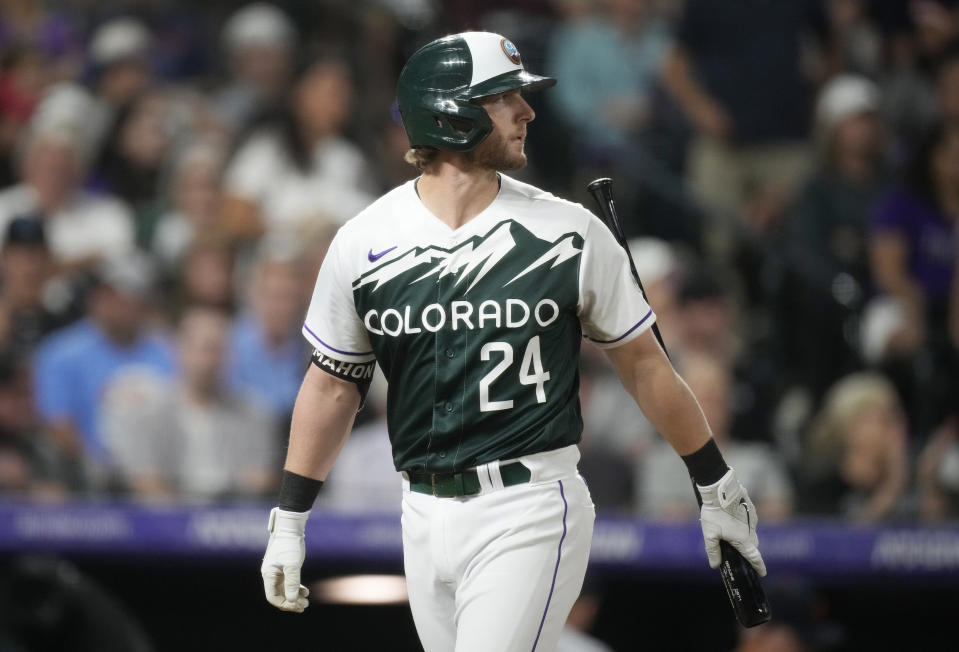 Colorado Rockies' Ryan McMahon reacts after striking out against Detroit Tigers relief pitcher Alex Lange in the 10th inning to end the baseball game Saturday, July 1, 2023, in Denver. (AP Photo/David Zalubowski)
