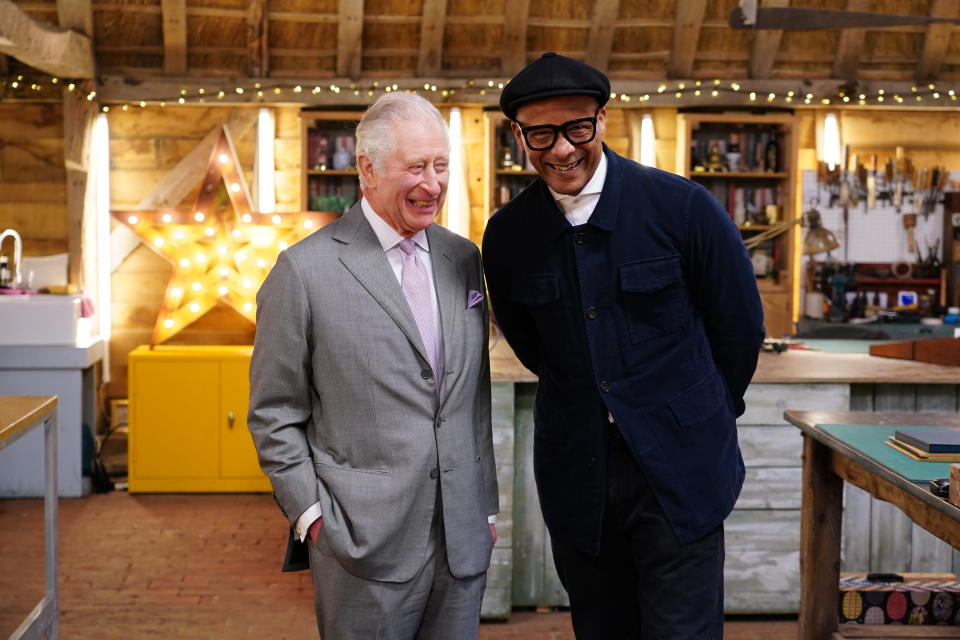 King Charles III, then Prince of Wales with Jay Blades (right) during a special episode of The Repair Shop as part of the BBC's centenary celebrations. Issue date: Wednesday October 26, 2022. (PA Images)