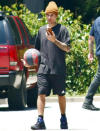 <p>Justin Bieber plays basketball in his neighborhood on Wednesday in Los Angeles. </p>