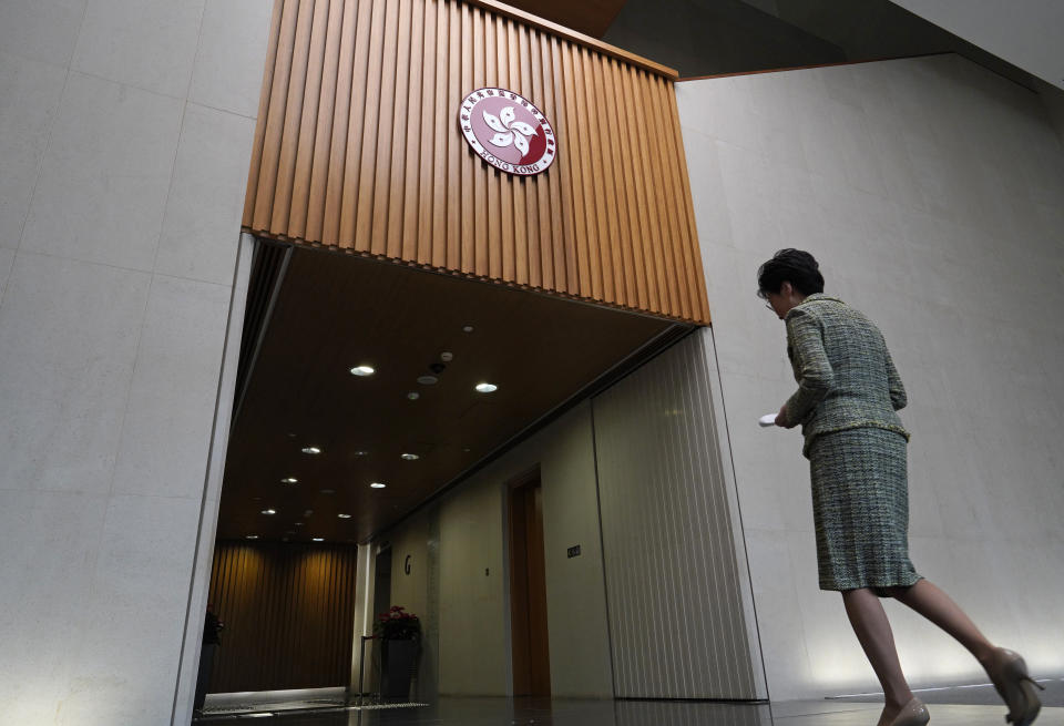 Hong Kong Chief Executive Carrie Lam leaves after a press conference at the government building in Hong Kong Tuesday, Sept. 24, 2019. The Beijing-backed leader is hoping to tone down increasingly violent protests ahead of China’s National Day celebrations on Oct. 1. The unrest was sparked by an extradition bill that has now been withdrawn but protesters now demand greater democracy. (AP Photo/Vincent Yu)