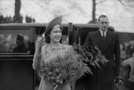 <p>Princess Elizabeth arrives at Dungannon High School for Girls in County Tyrone during a trip to Northern Ireland on 21 March 1946. (Getty Images)</p> 