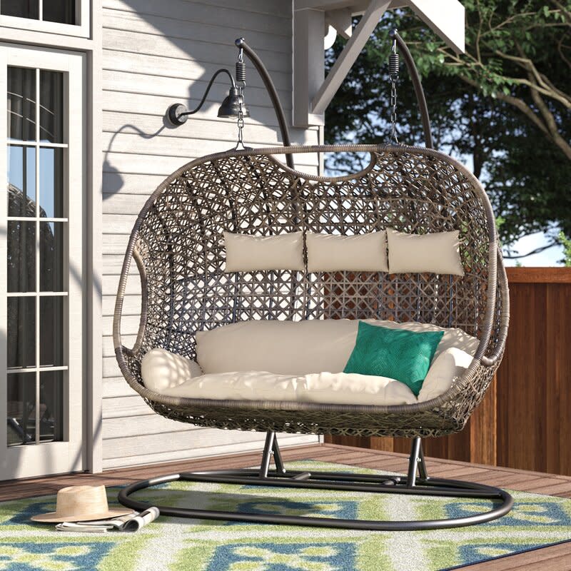 <p><a href="https://go.redirectingat.com?id=74968X1596630&url=https%3A%2F%2Fwww.wayfair.com%2F--%2Fpdp%2Fdakota-fields--wallis-porch-swing-with-stand-x111124701-l172-w000013690.html&sref=https%3A%2F%2Fwww.thepioneerwoman.com%2Fhome-lifestyle%2Fdecorating-ideas%2Fg39432199%2Fbest-outdoor-hanging-egg-chair%2F" rel="nofollow noopener" target="_blank" data-ylk="slk:Shop Now;elm:context_link;itc:0;sec:content-canvas" class="link rapid-noclick-resp">Shop Now</a></p><p>Dakota Fields Wallis Porch Swing with Stand</p><p>wayfair.com</p><p>$2099.99</p><span class="copyright">Wayfair</span>