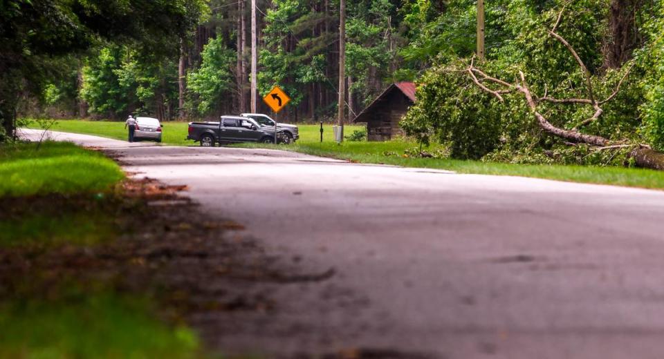 Men in trucks block Moselle Road near the entrance to the Murdaugh property on Tuesday, June 7, 2021 where Maggie Murdaugh, 52, and her son Paul Murdaugh, 22, died from gunshot wounds in an apparent homicide in Colleton County.